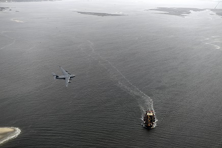 A C-17 Globemaster III flying over the coast of North Carolina 