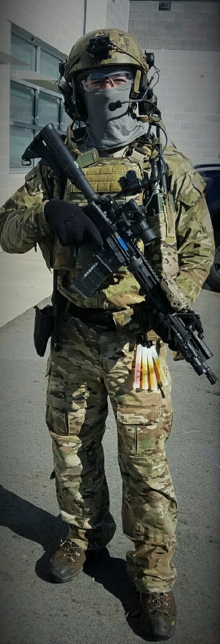A photo of a TACP in full battle gear holding an M4 rifle 